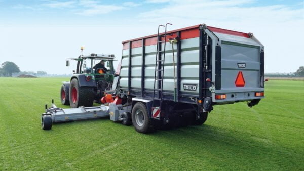 Vacuum trailer S12 sweeping and collecting a wide-area on a sod farm
