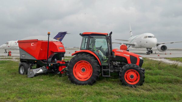 Vacuum mower on the airside along the apron and taxiway